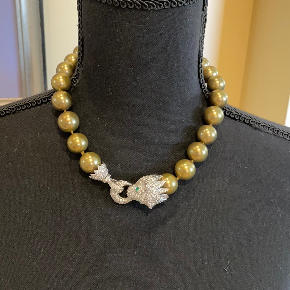 Gold ball necklace with lion diamond clasp